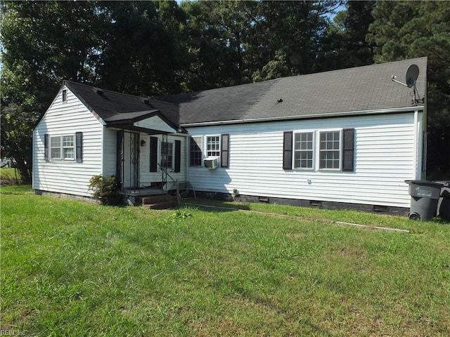 view of front facade featuring a front yard