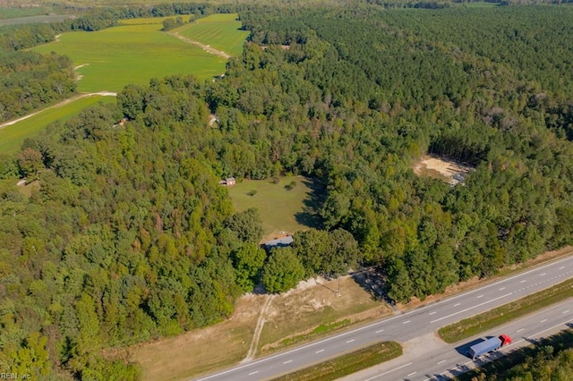 birds eye view of property featuring a rural view