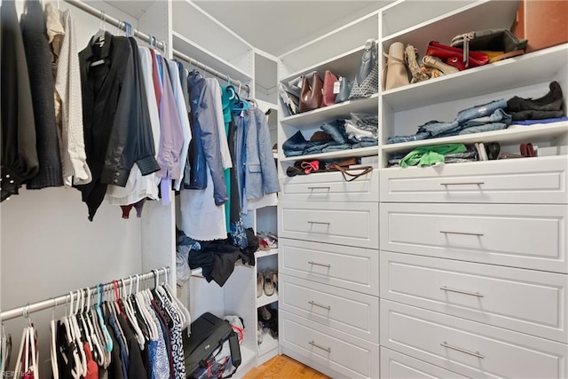 walk in closet featuring light hardwood / wood-style floors