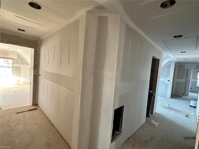 corridor featuring vaulted ceiling