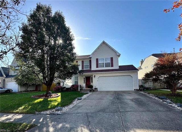 view of property featuring a front lawn and a garage