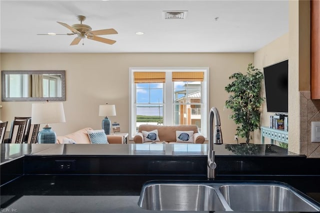 kitchen with sink and ceiling fan