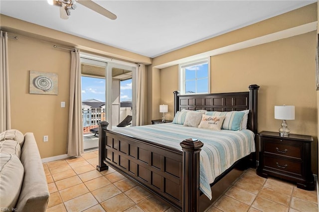 tiled bedroom with access to outside and ceiling fan