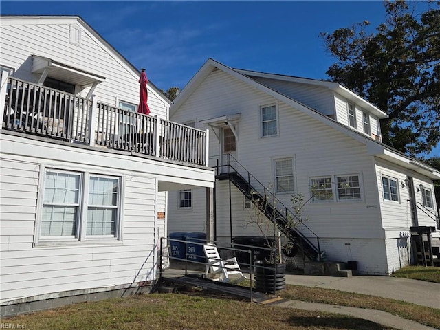 view of front of property featuring cooling unit