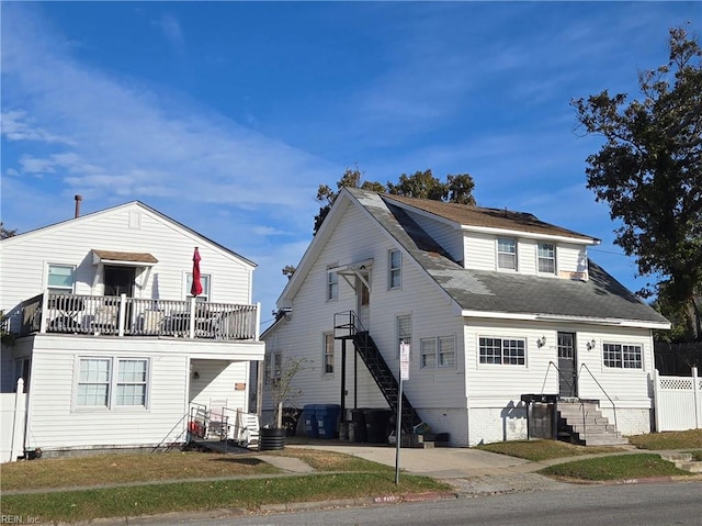 front facade with a balcony