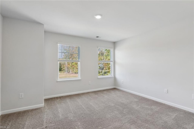 view of carpeted spare room