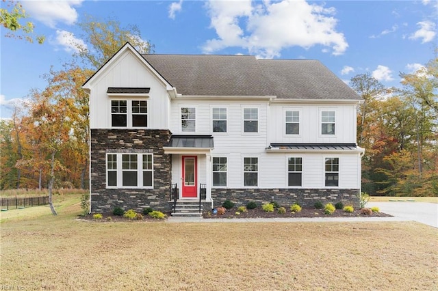 view of front of home with a front lawn