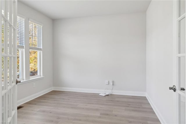 empty room with light wood-type flooring