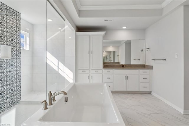 bathroom with vanity and a washtub