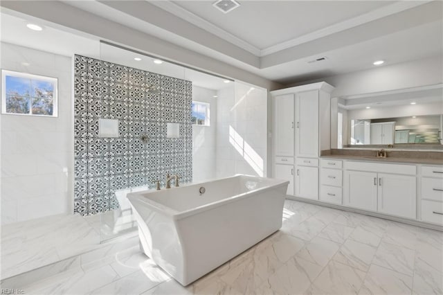 bathroom featuring vanity, crown molding, independent shower and bath, and a healthy amount of sunlight