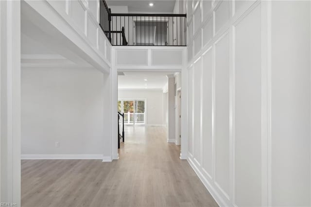 corridor featuring light wood-type flooring