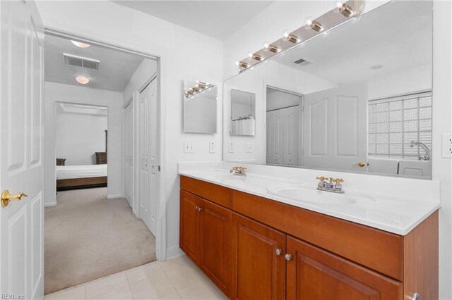 bathroom featuring vanity and tile patterned floors