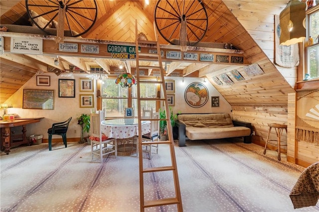 living area featuring wooden ceiling, wood walls, and lofted ceiling