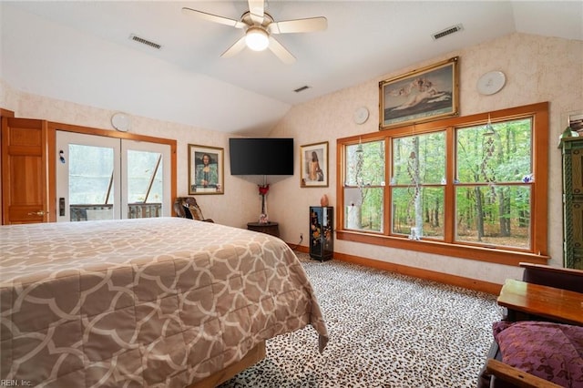 bedroom with access to outside, vaulted ceiling, and ceiling fan