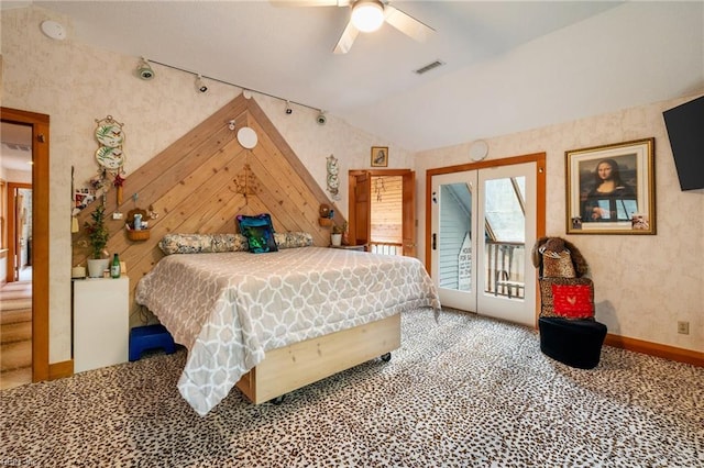 bedroom with ceiling fan, access to exterior, and lofted ceiling