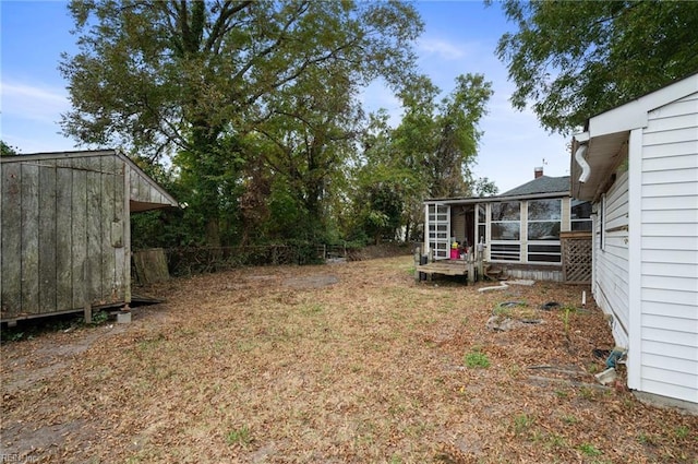 view of yard with a storage shed