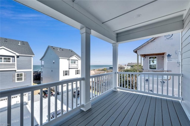 deck featuring a water view