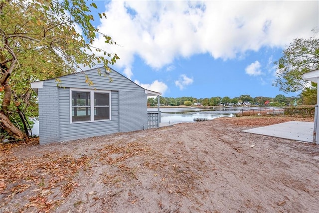 exterior space featuring a water view