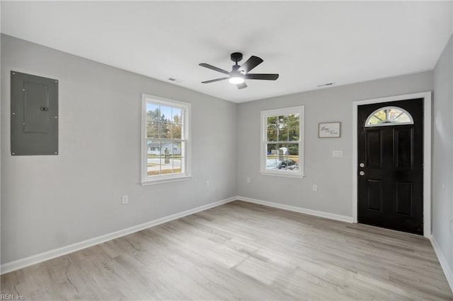 entrance foyer featuring electric panel, light hardwood / wood-style floors, and ceiling fan