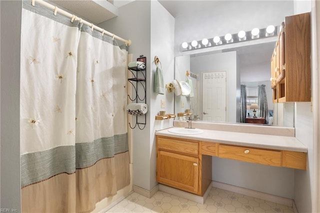 bathroom with vanity and a shower with curtain