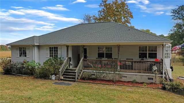 view of front of property featuring a front yard and a porch