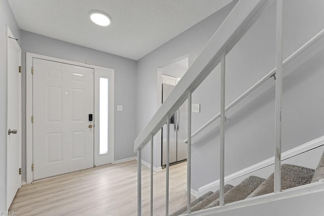 entrance foyer featuring light hardwood / wood-style floors