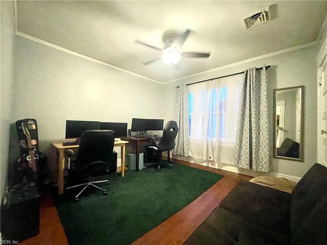 office space featuring ceiling fan and crown molding