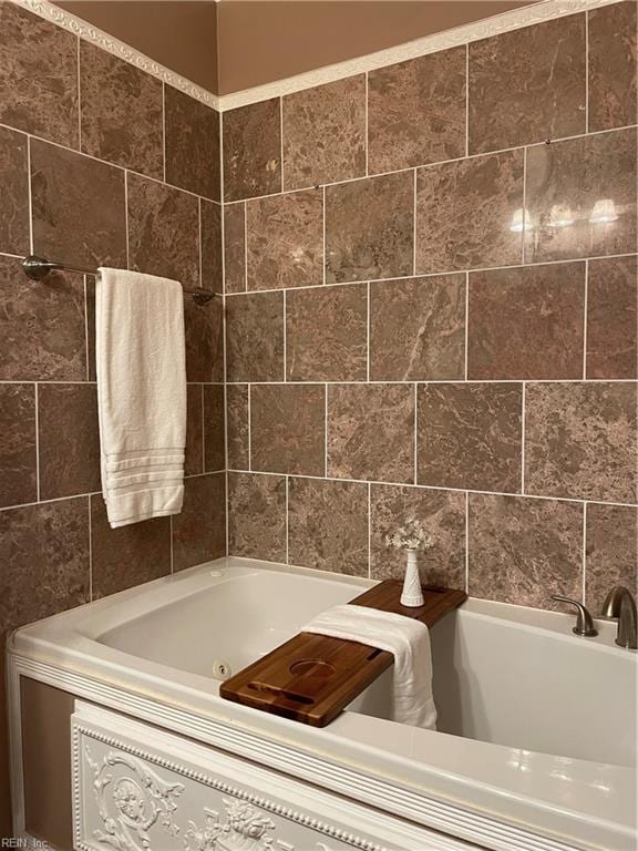 bathroom featuring a tub to relax in