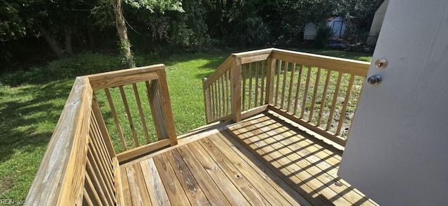 wooden deck with a yard