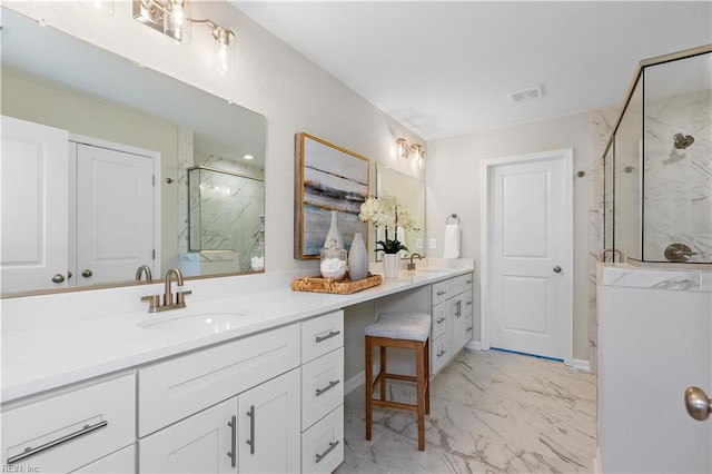 bathroom with vanity and walk in shower