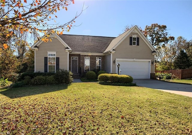 view of front facade featuring a garage and a front lawn