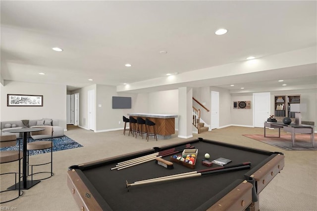 rec room featuring billiards, light colored carpet, and indoor bar