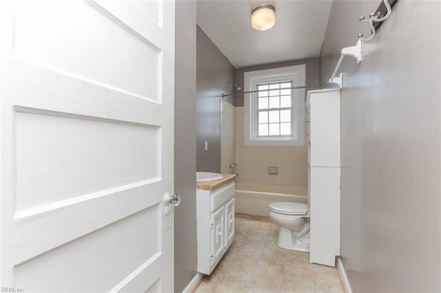 full bathroom with vanity, toilet, and washtub / shower combination