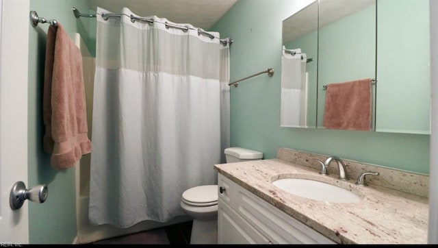 full bathroom featuring vanity, toilet, and shower / tub combo