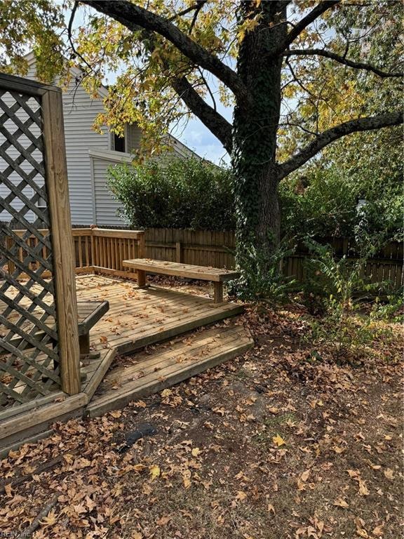 view of yard with a wooden deck