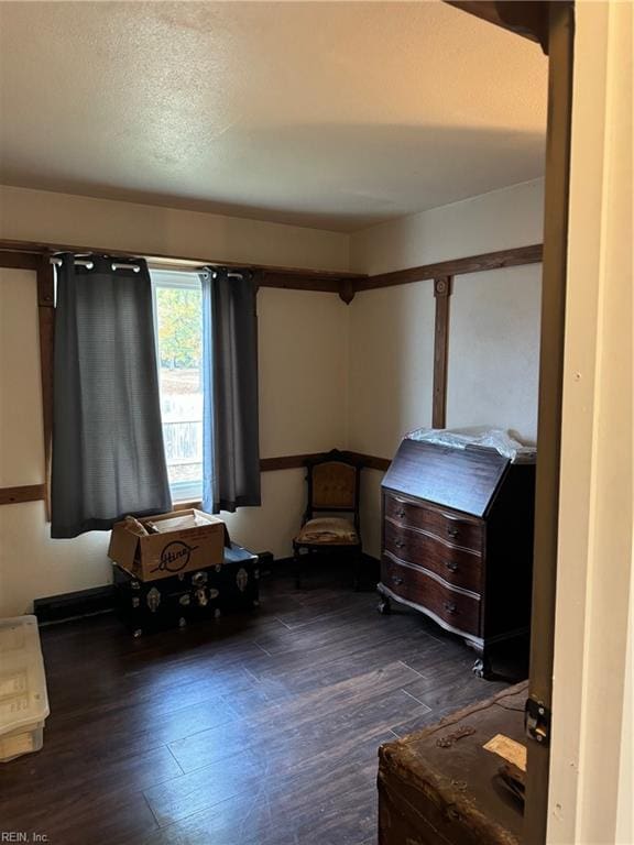 bedroom featuring dark hardwood / wood-style floors