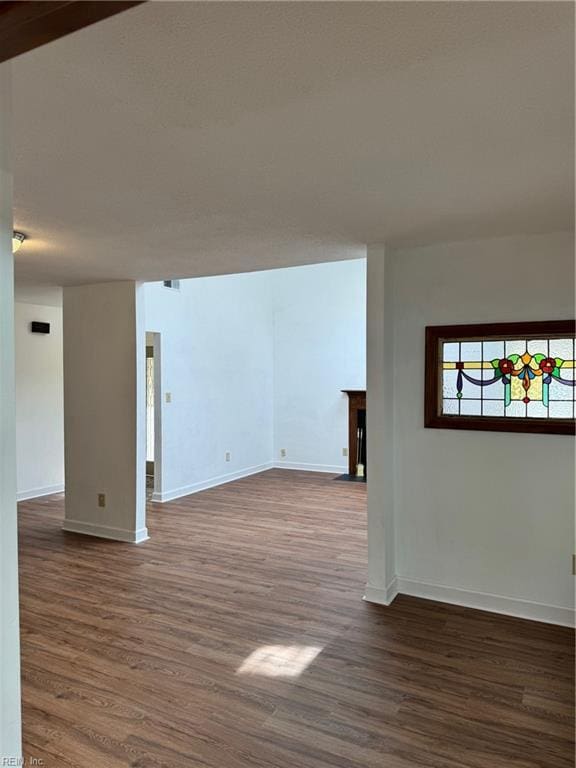 spare room featuring dark hardwood / wood-style floors