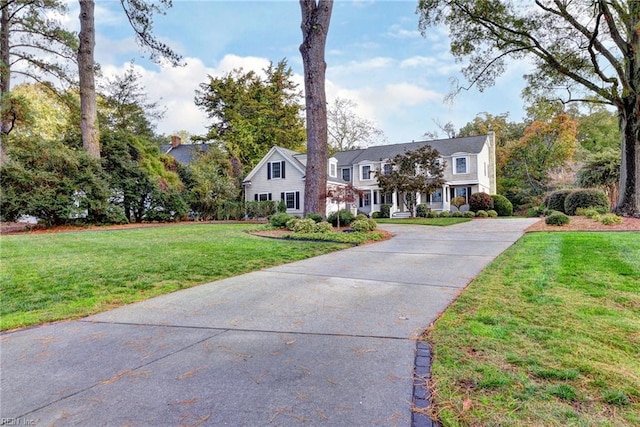 view of front of property with a front lawn