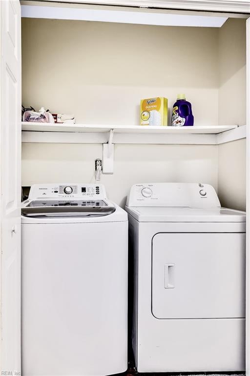 laundry area featuring washer and clothes dryer