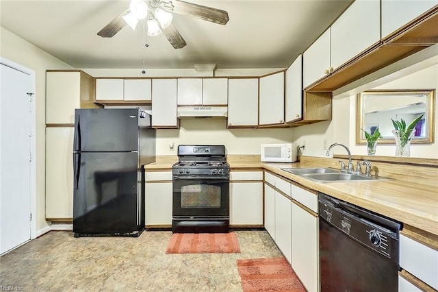 kitchen with white cabinetry, ceiling fan, black appliances, and sink