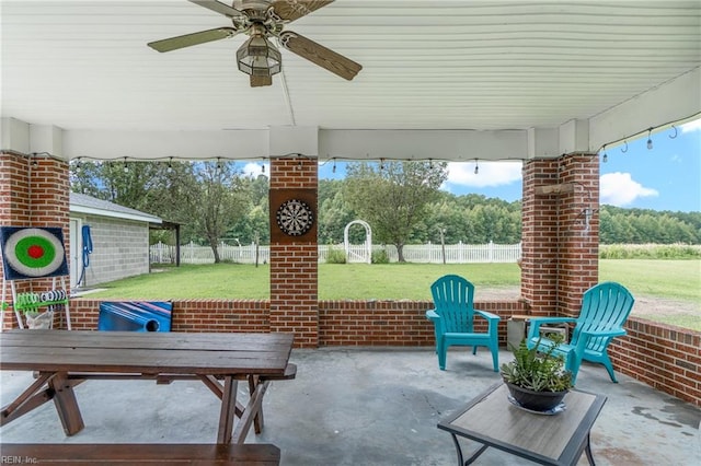 view of patio featuring ceiling fan