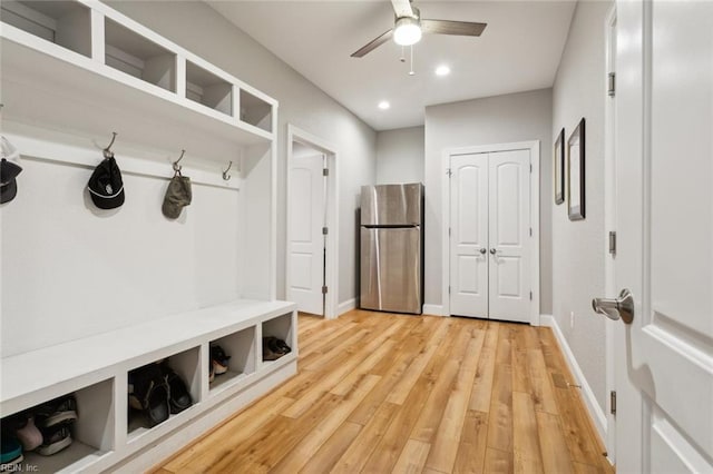 mudroom featuring ceiling fan and light wood-type flooring