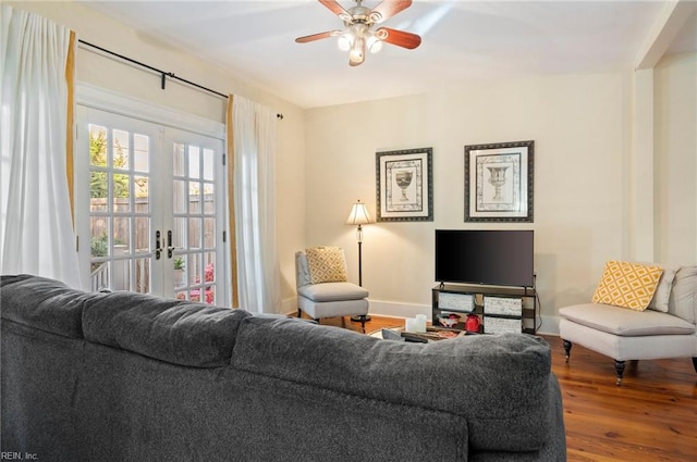 living room with french doors, hardwood / wood-style flooring, and ceiling fan