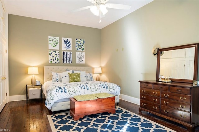 bedroom featuring ceiling fan and dark hardwood / wood-style floors