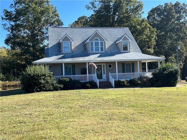 view of front of house featuring a front yard and covered porch