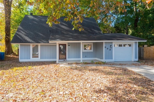 view of front of house with a garage and a porch