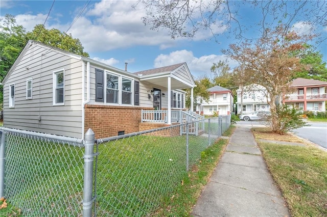 view of front facade with a porch and a front yard