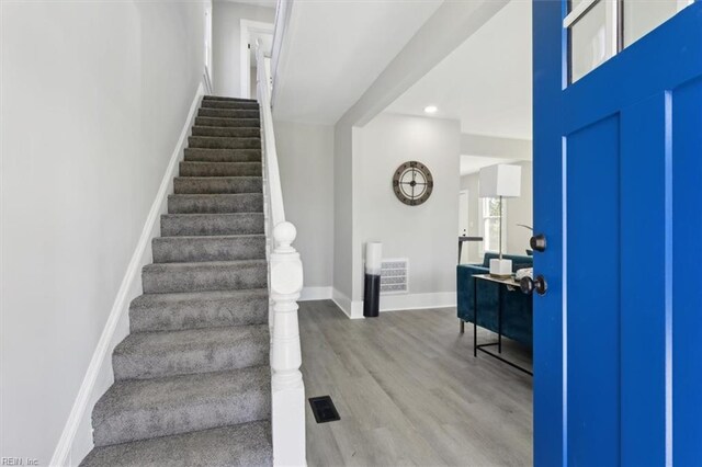 318 Sycamore Ave, Newport News, VA 23607 - stairs with wood finished floors, baseboards, and recessed lighting