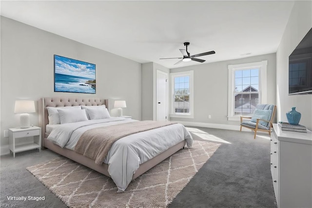 carpeted bedroom with ceiling fan