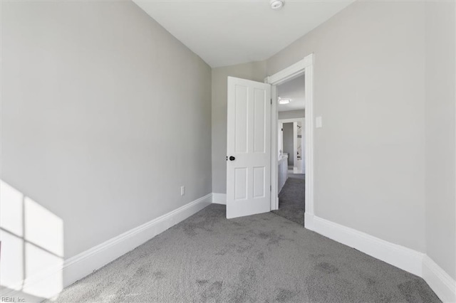 empty room featuring carpet floors